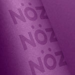 Load image into Gallery viewer, Close up view of Nöz purple tinted sunscreen 
